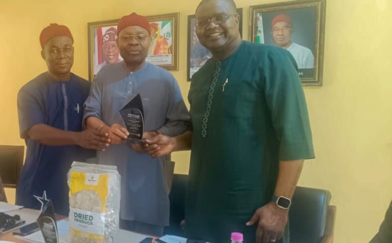 Champion Plaque, won by the UAES Team, was formally presented by the Acting Vice-Chancellor, Prof. C. C. Eze, to the Chairman of the Governing Council